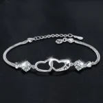 Bracelet double coeur ajouré pour femme 2