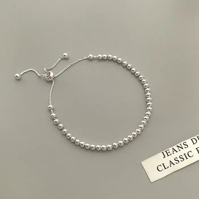 Bracelet couple boules fines pour femme 1
