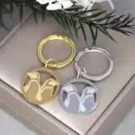 Porte-clés couple pingouins acier 3