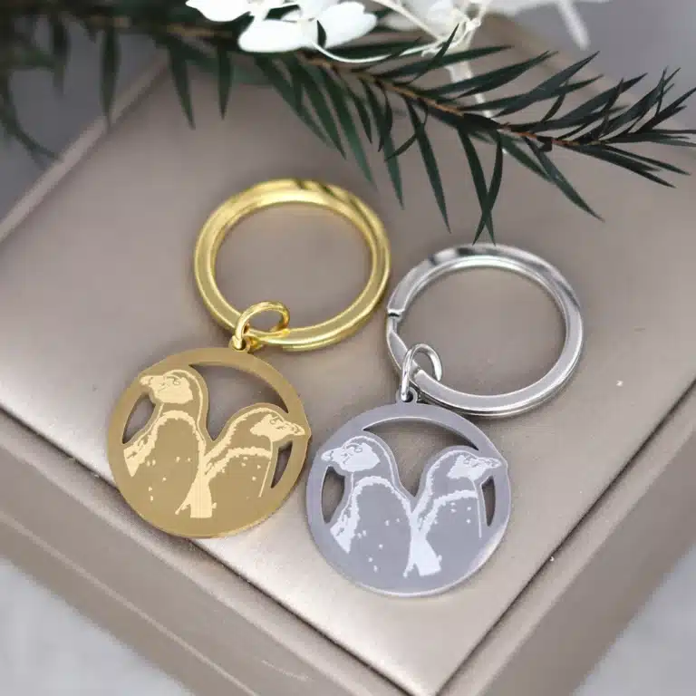 Porte-clés couple pingouins acier 3