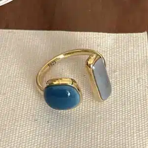 Bague femme ouverte dorée pierres bleues 1
