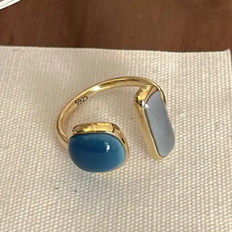 Bague femme ouverte dorée pierres bleues 1