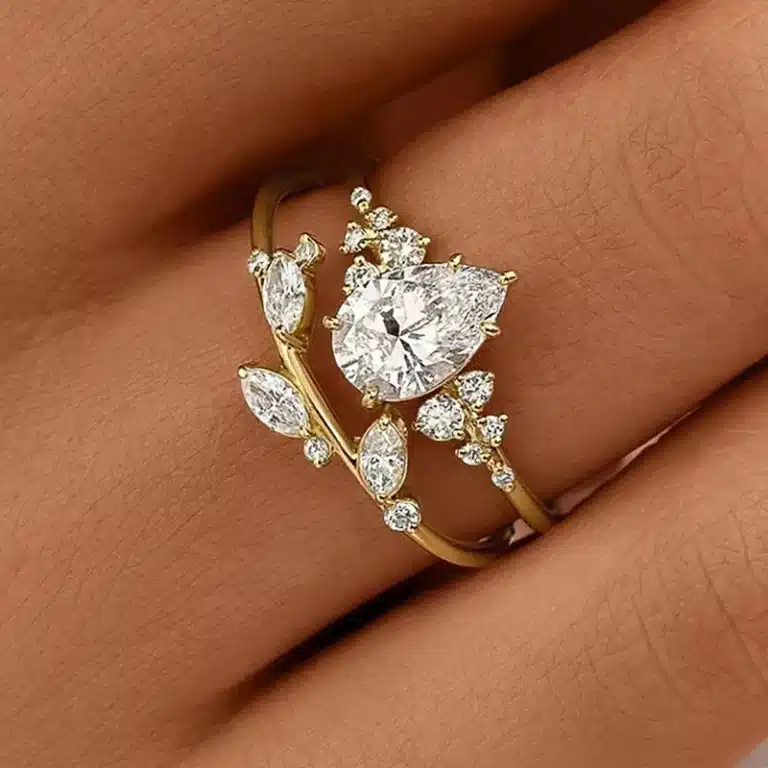 Bague femme fleur dorée pierre et goutte 1