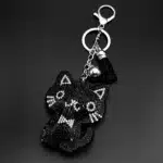 Porte-clés femme chat noir brillant strass 1