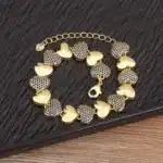 Bracelet femme coeurs épais dorés 3