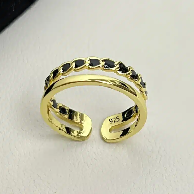 Bague femme couronne multi-rangs noire et dorée 1