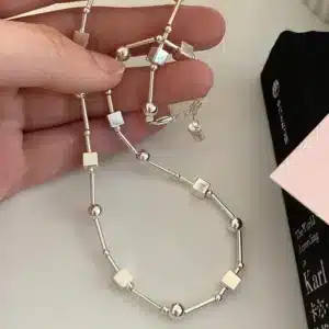 Collier femme formes géométriques argentées 1