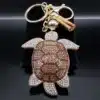 Porte-clés femme tortue brillante