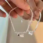 Bracelet tennis étoile perle papillon 1