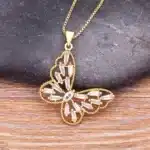 Collier femme papillon doré et blanc ajouré 1