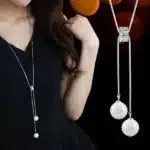 Collier long femme perles blanches 1