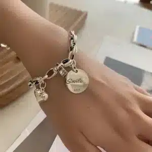 Bracelet argent femme breloques coeurs 1