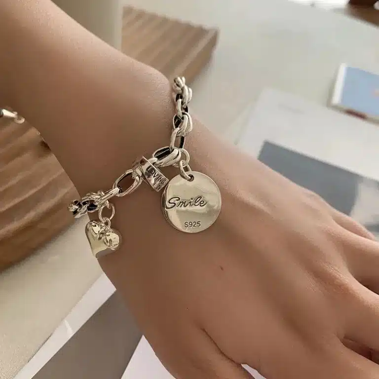 Bracelet argent femme breloques coeurs 1