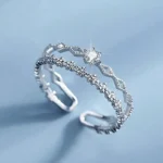 Bague double anneau brillants avec fleurs 1