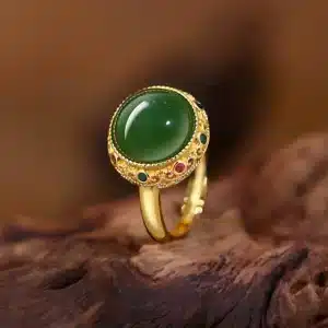 Bague femme princesse ronde dorée et verte 1
