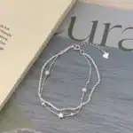 Bracelet double pour femme perles et étoile 1