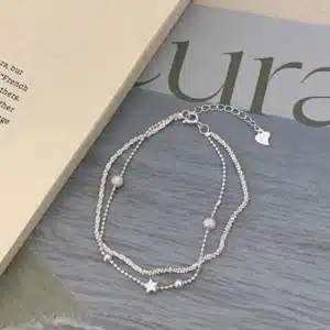 Bracelet double pour femme perles et étoile 1