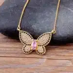 Collier femme papillon brillant rose et noir 1
