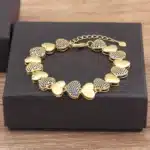 Bracelet femme coeurs épais dorés 1
