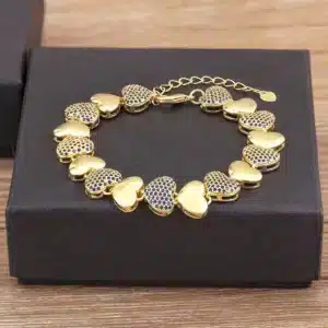 Bracelet femme coeurs épais dorés 1