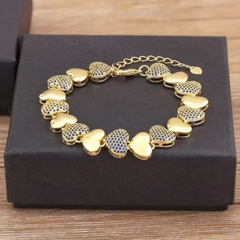 Bracelet femme coeurs épais dorés 1