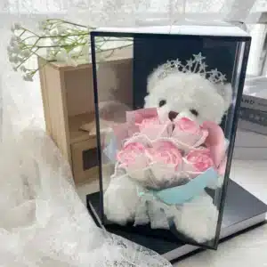 Ours en peluche avec bouquet de roses 1