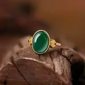 Bague femme princesse dorée pierre verte ovale 1