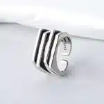 Bague de promesse géométrique noire et argent 1