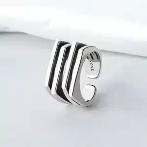 Bague de promesse géométrique noire et argent 1