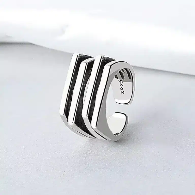 Bague de promesse géométrique noire et argent 1