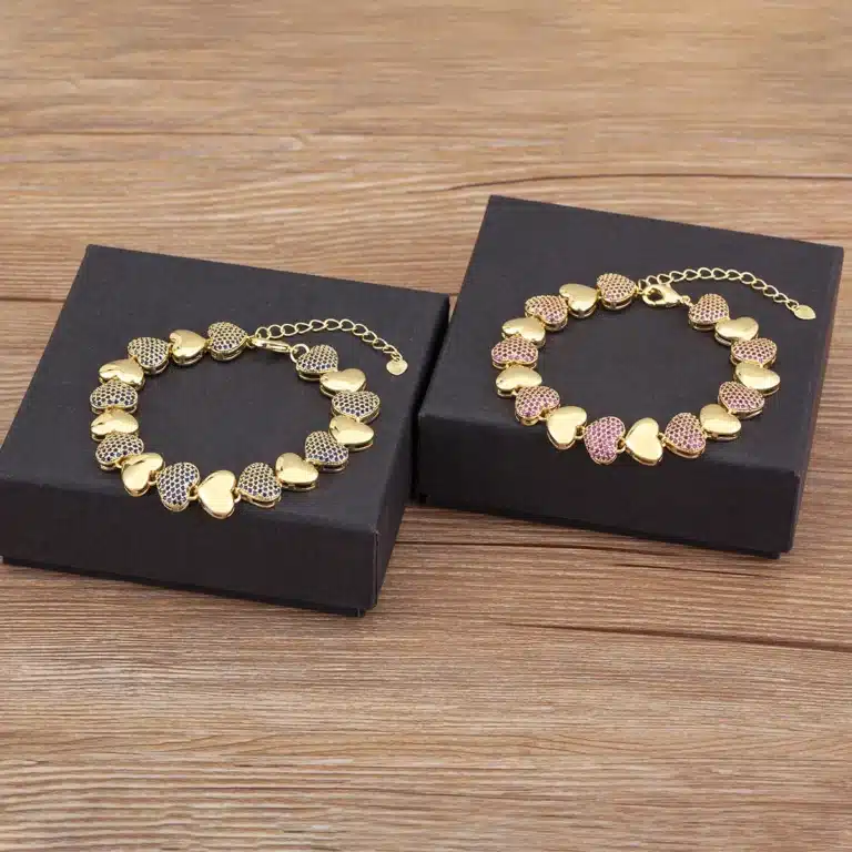 Bracelet femme coeurs épais dorés 4