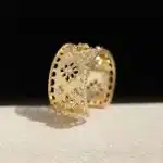 Bague femme manchette dorée fleurs ajourées 1