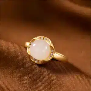 Bague femme cabochon blanc dorée 1