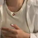Collier femme trio de pierres rouges 1