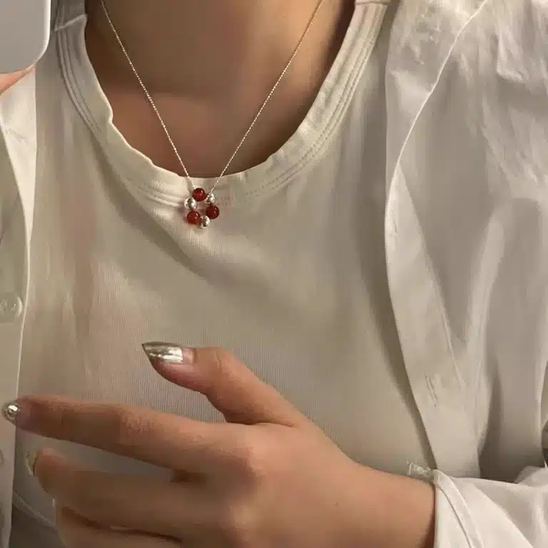 Collier femme trio de pierres rouges 1
