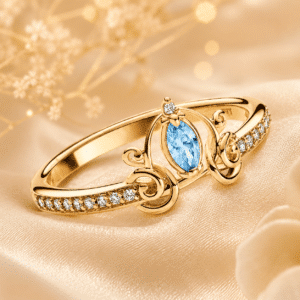 Bague femme carrosse pierre bleue dorée