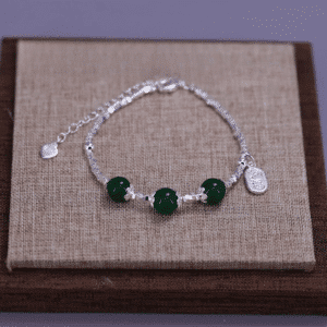 Bracelet perles vertes femme